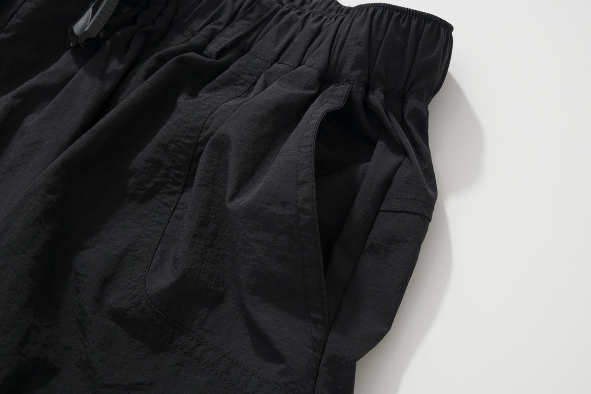 AMULET PATCHWORK POCKETS SHORTS BLACK