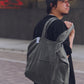 AMULET washed tote bag in grey, worn on shoulder