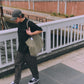 AMULET washed tote bag in olive, worn on shoulder
